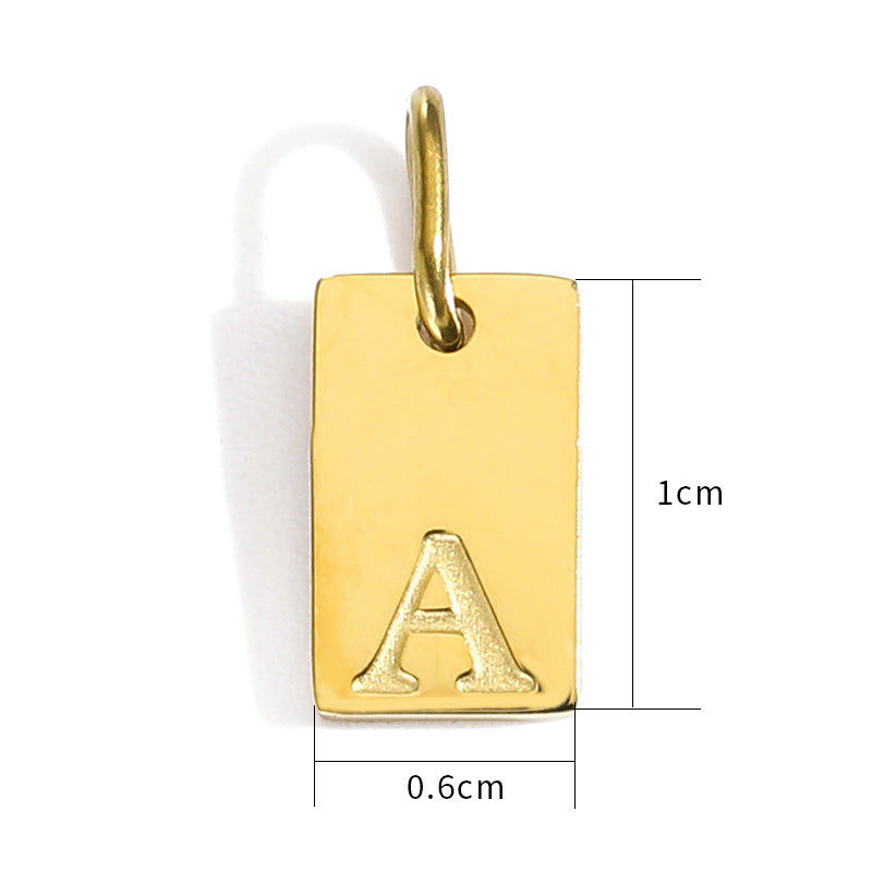Initial letter gold disk pendant