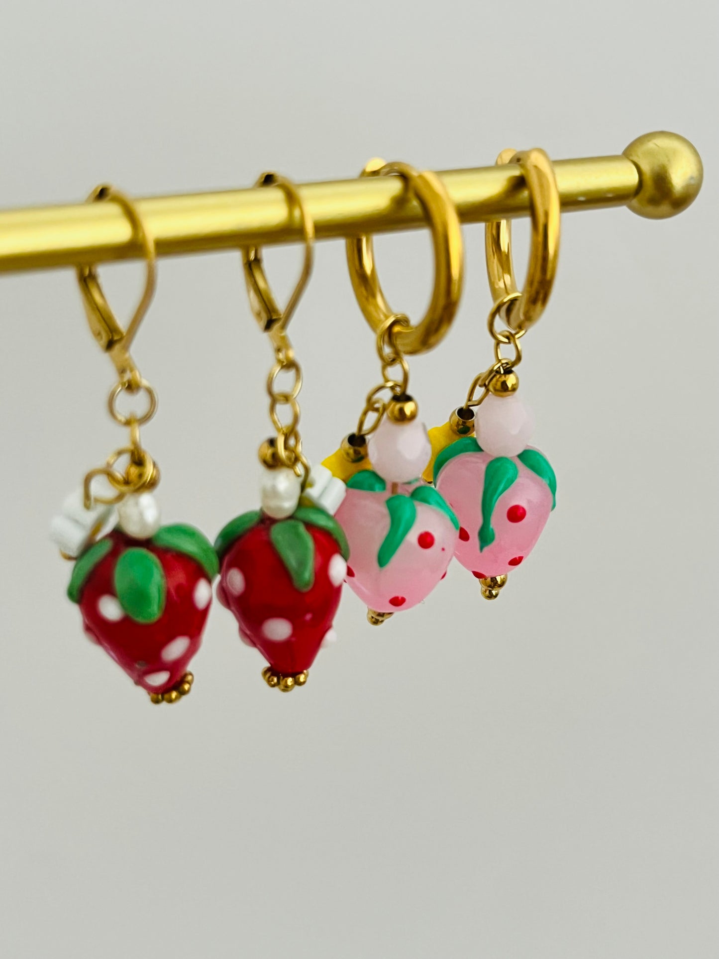 Strawberry charm gold earrings
