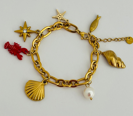 Lobster and shell gold charm bracelet
