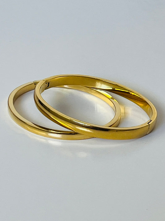 Athena stainless steel clip on gold bangle