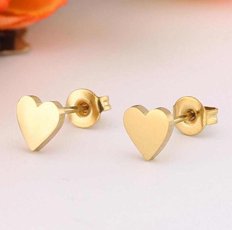 Heart shaped gold stud earrings