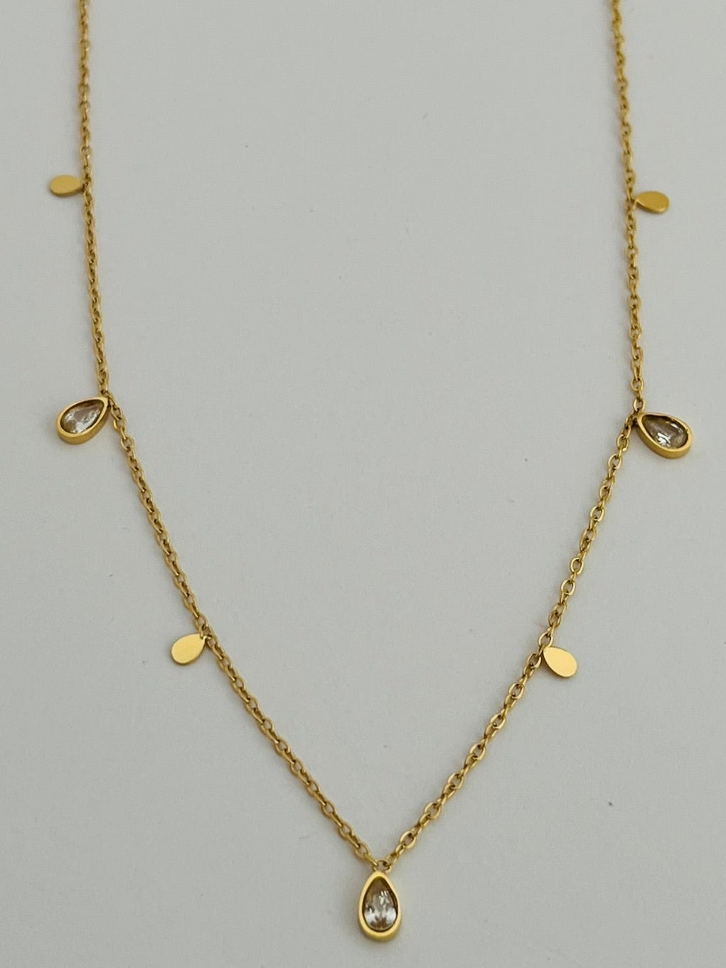 Nova teardrop disk gold shimmer necklace