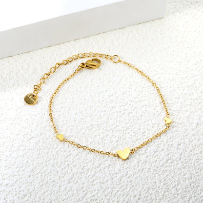 Wispy heart gold bracelet