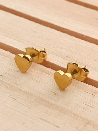 Heart shaped gold stud earrings