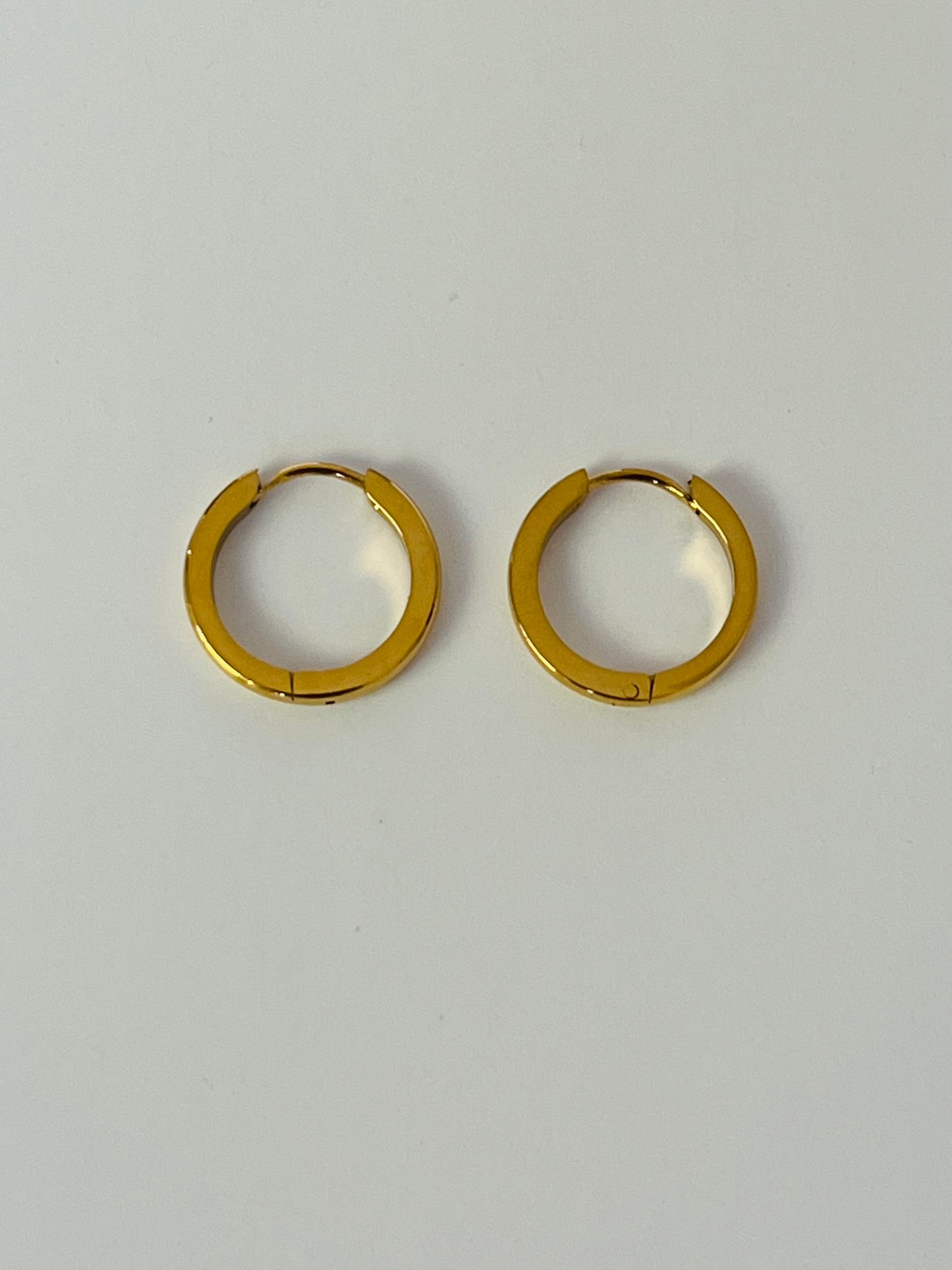 Stevie curved skinny gold hoop earring