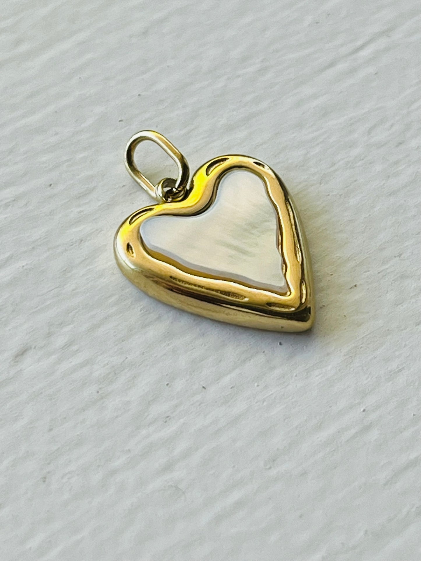 Heart charm with shell inlay