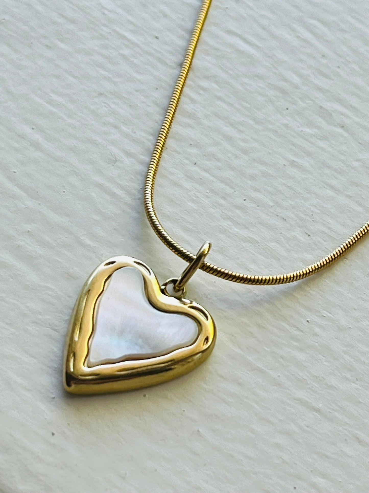Heart charm with shell inlay