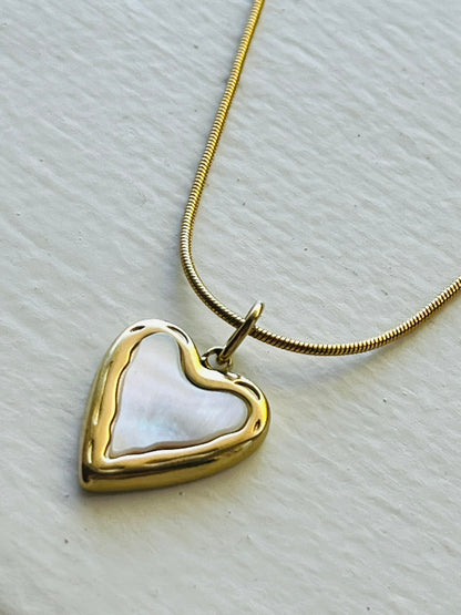 Heart charm with shell inlay