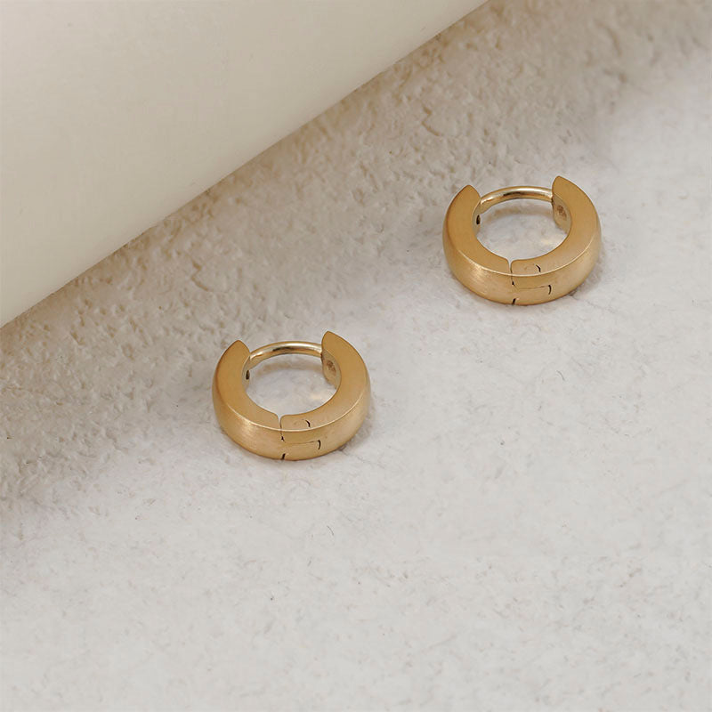 Della tiny huggie earrings