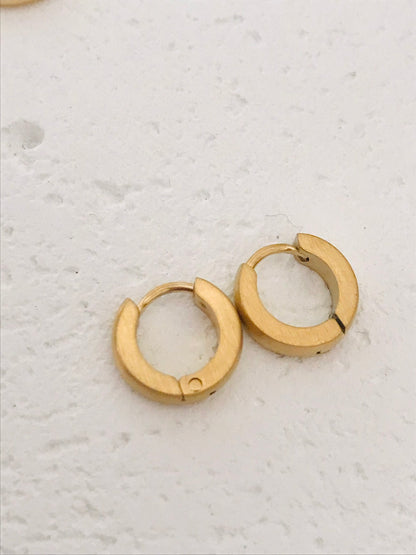 Della tiny huggie earrings