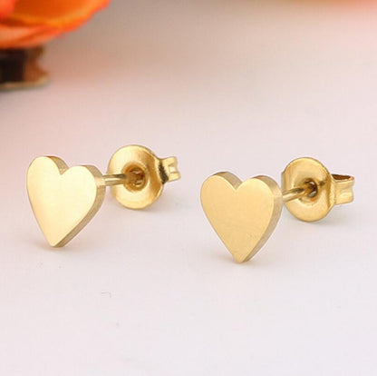 Heart shaped gold stud earrings
