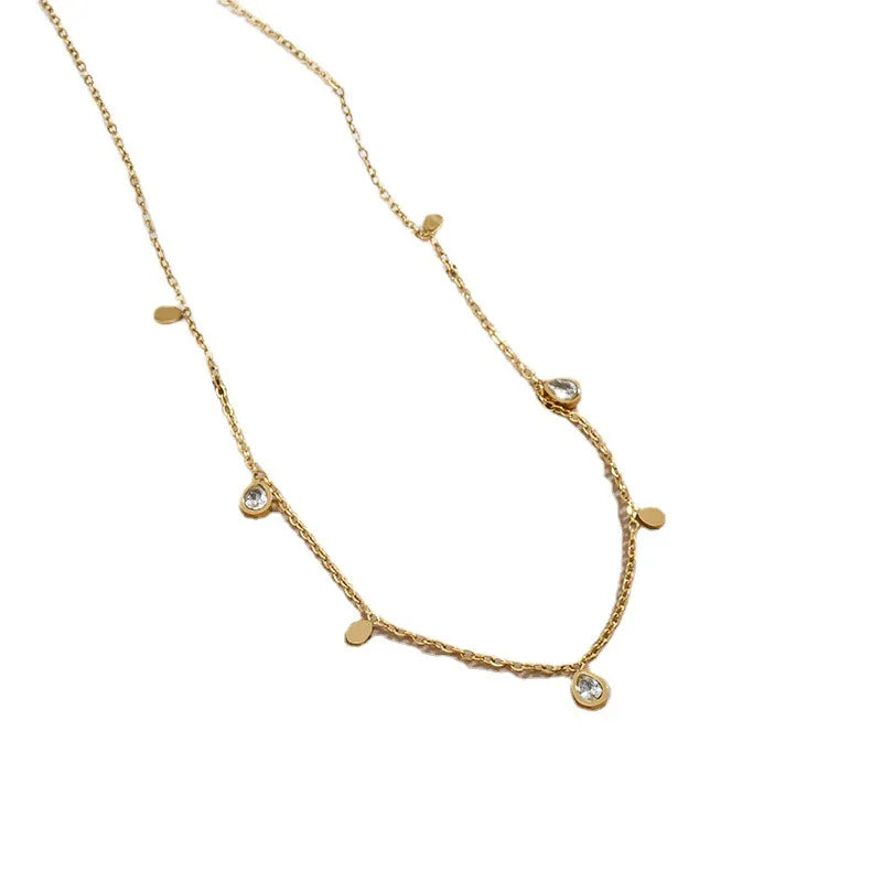 Nova teardrop disk gold shimmer necklace