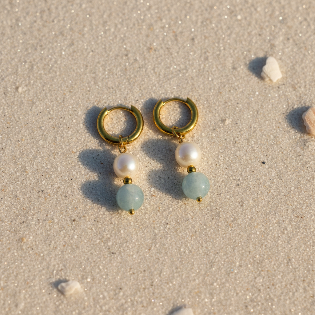 Coastal Wanderer Pearl and Aquamarine Earrings – Beach Sand Flat Lay