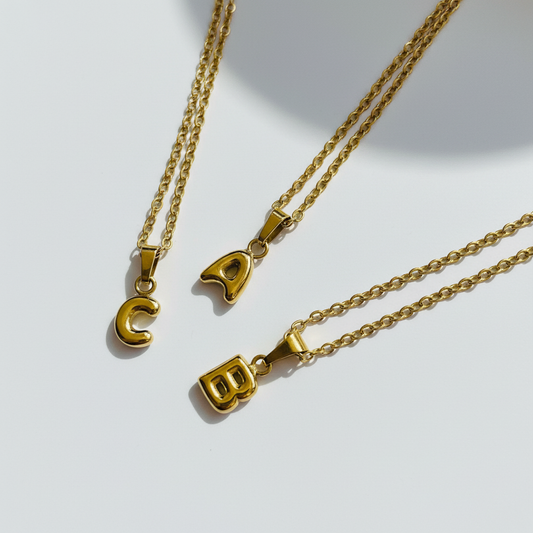 Gold necklaces product photography