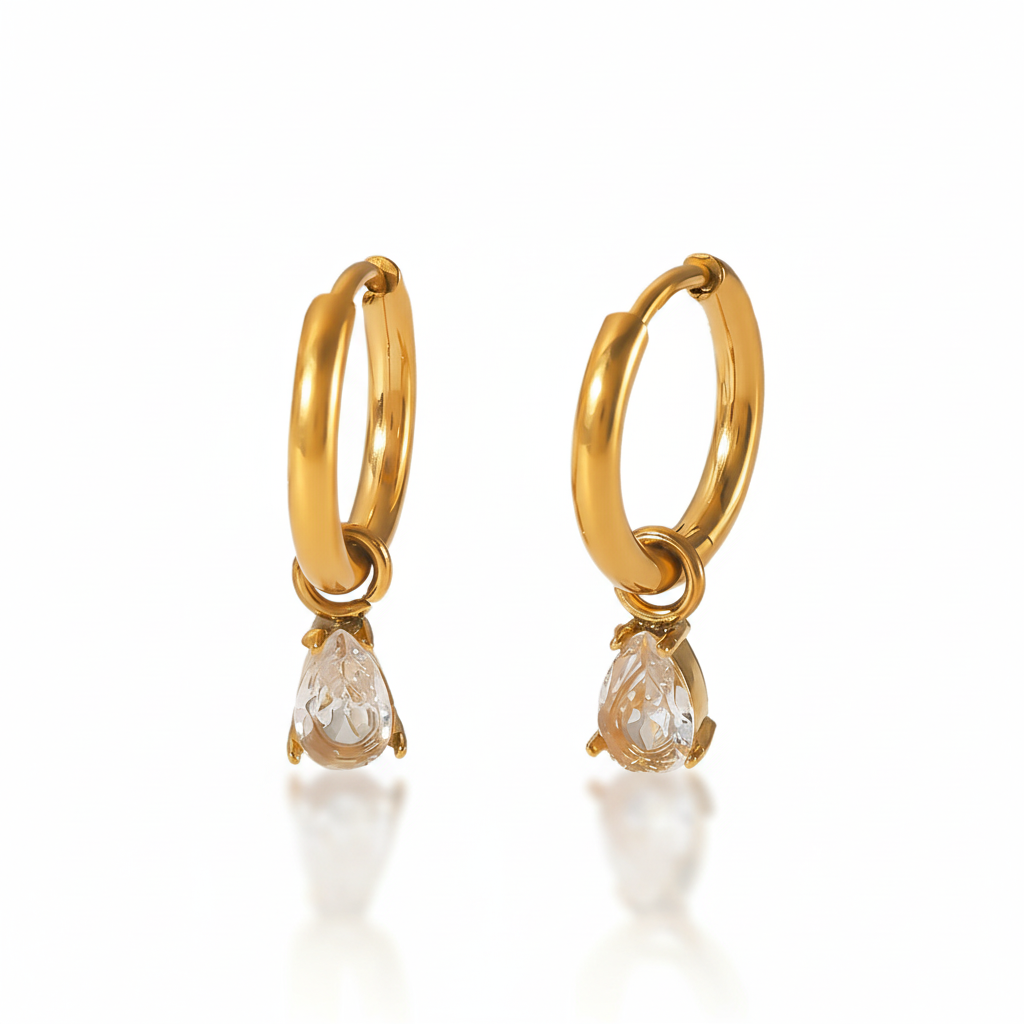 Lydia gold hoop earrings with teardrop crystal pendant, pure white background