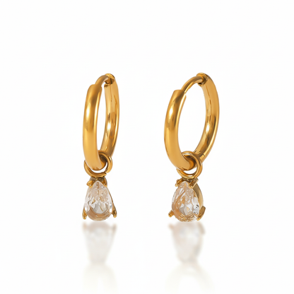 Lydia gold hoop earrings with teardrop crystal pendant, pure white background