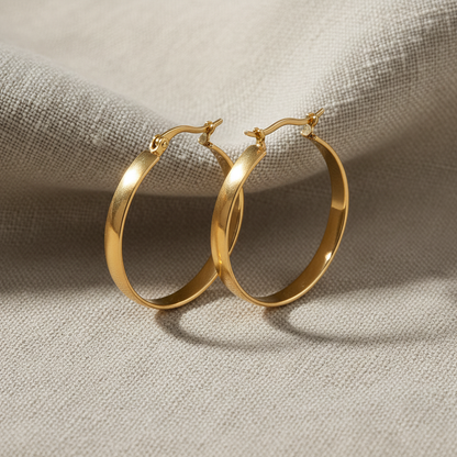 Mila Classic Gold Hoop Earrings on Linen