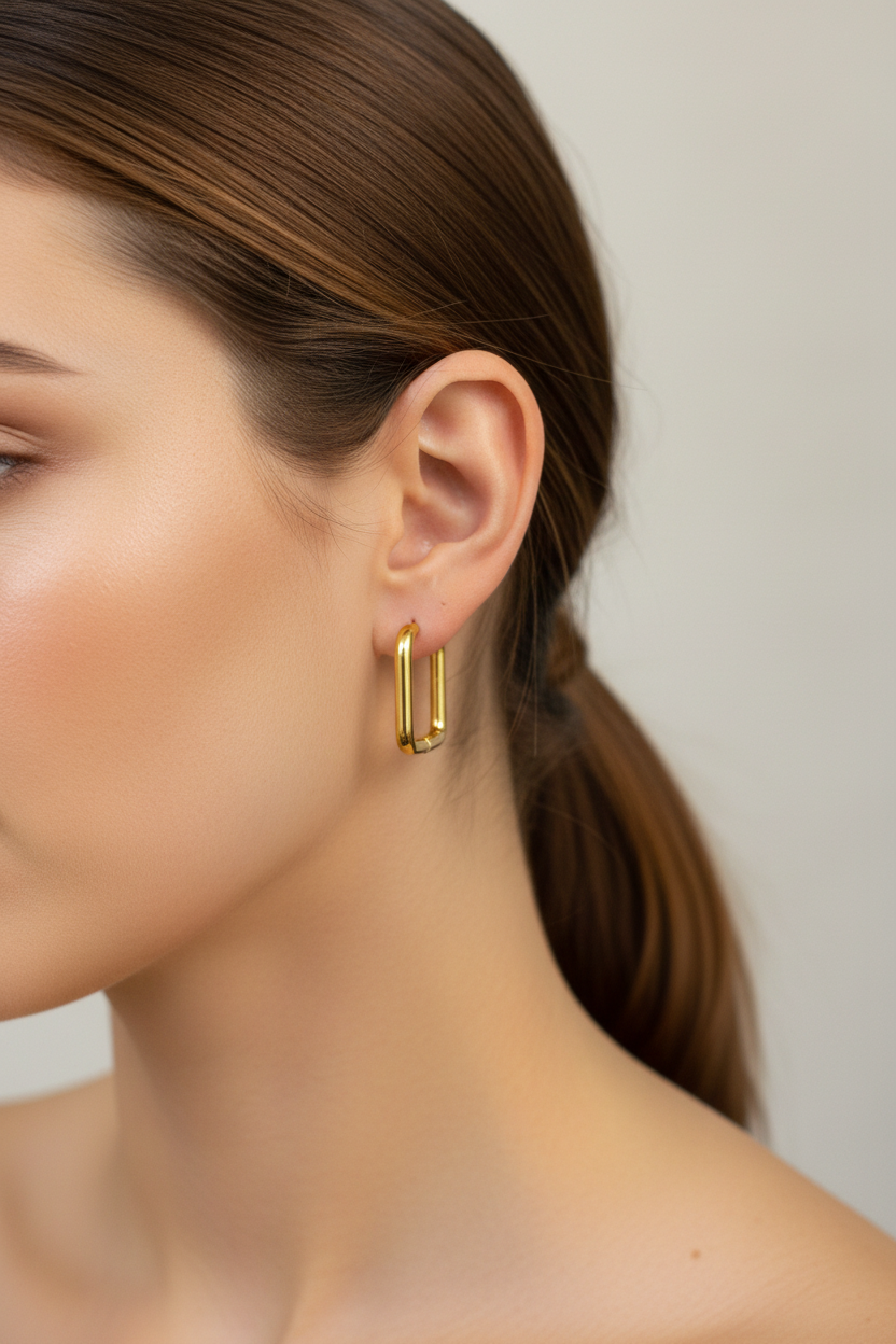 Woman wearing Millie square hoop earrings - side profile