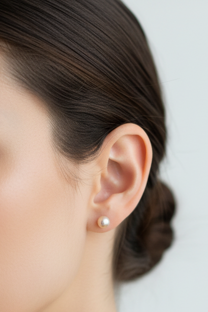Woman wearing pearl earrings - lifestyle shot with smaller size